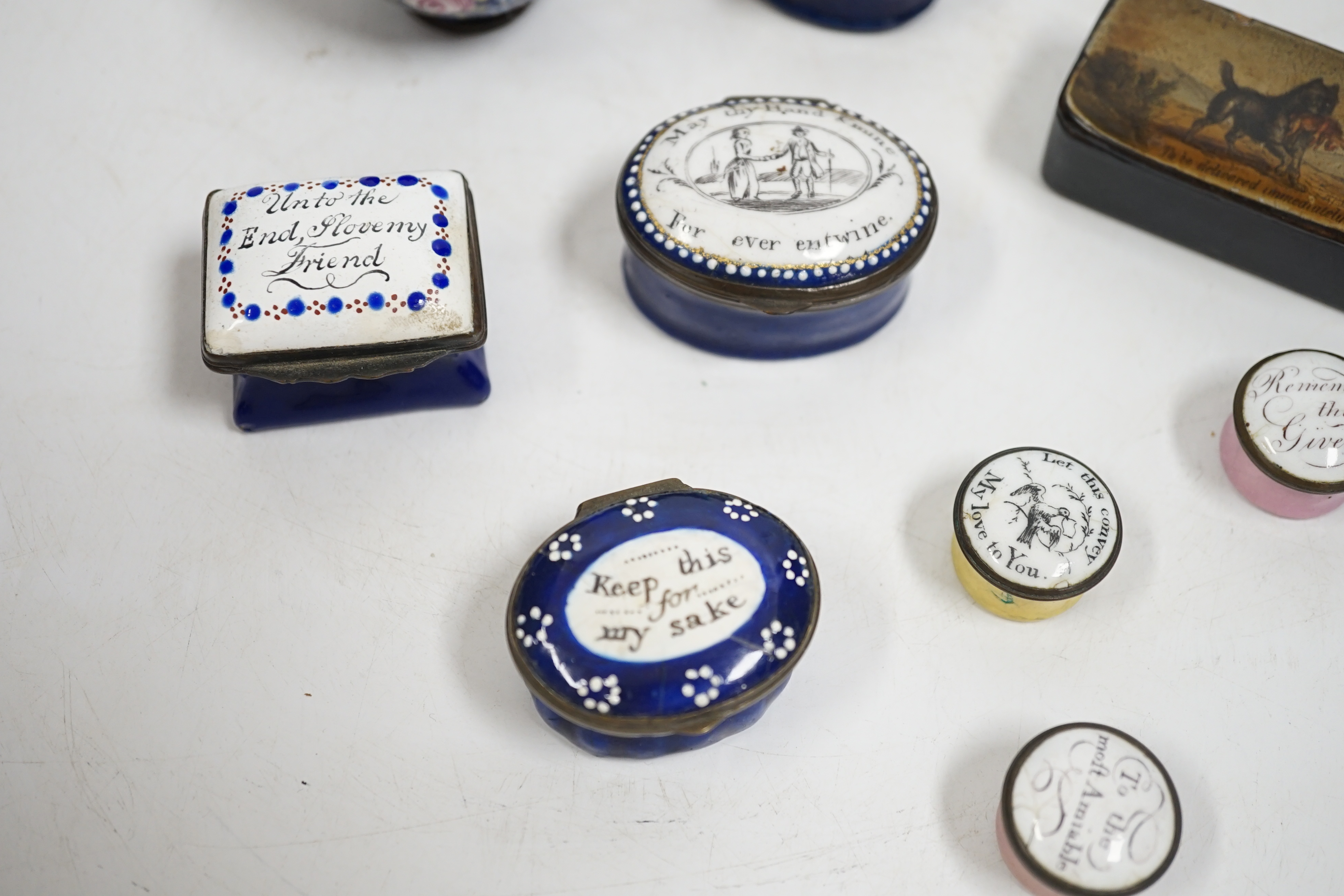 Two South Staffordshire enamel sweetheart patch boxes and two similar snuff boxes, three South Staffordshire enamel pill boxes, all late 18th/early 19th century, South Staffordshire enamel cup and associated cover and a